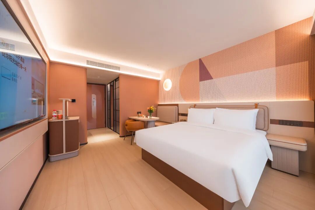 桔子酒店大堂桔色绿色大地色设计风格